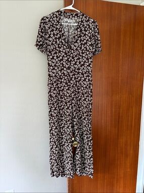 Reformation button down floral jumpsuit
